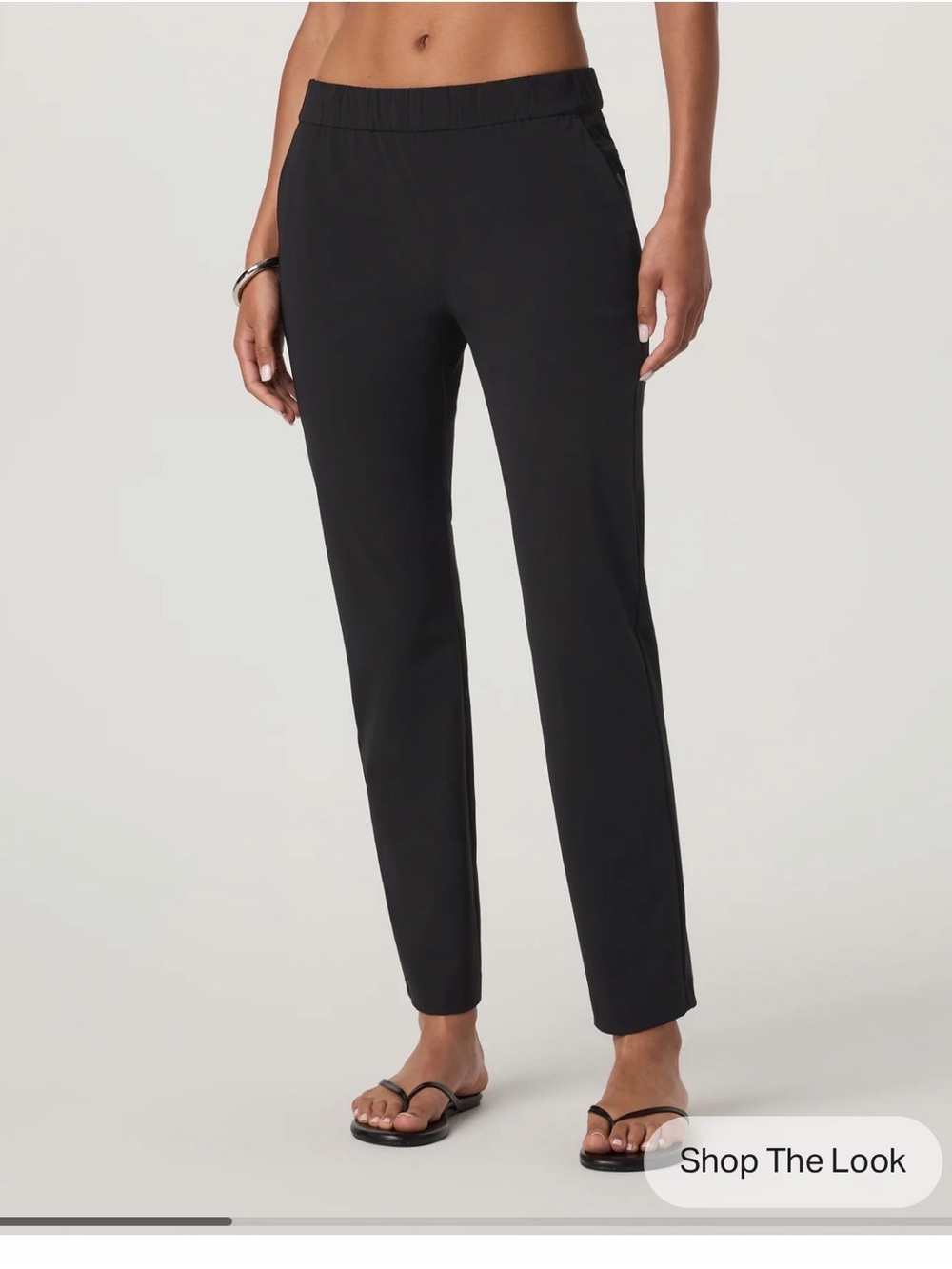 Two pairs Vuori Miles Ankle pants in Moss and Charcoal
